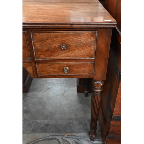 74 - A 19th century mahogany dressing table with five drawers, on turned and reeded supports, 90 cm w x 4... 