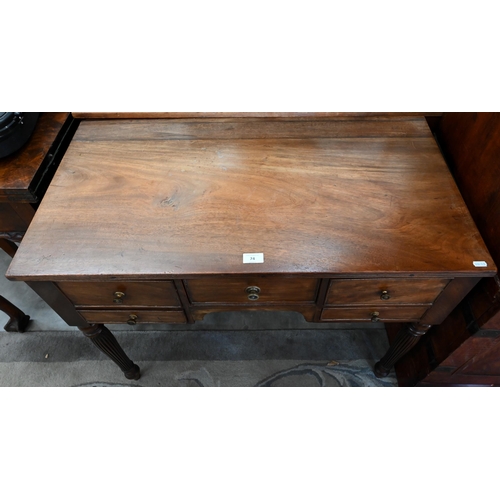 74 - A 19th century mahogany dressing table with five drawers, on turned and reeded supports, 90 cm w x 4... 