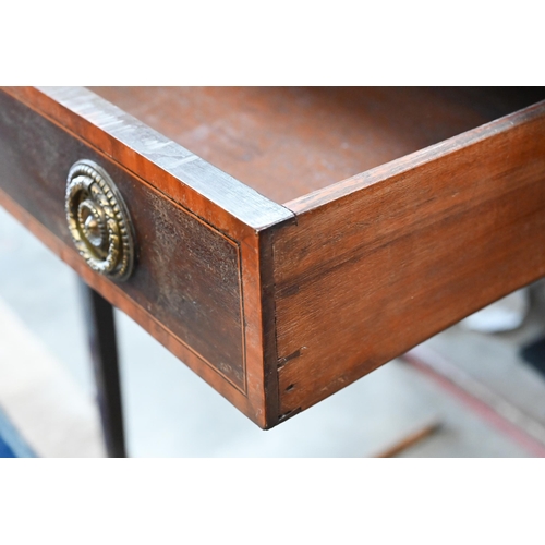 78 - An Edwardian mahogany hall table with crossbanded oval top over a frieze drawer raised on tapering s... 