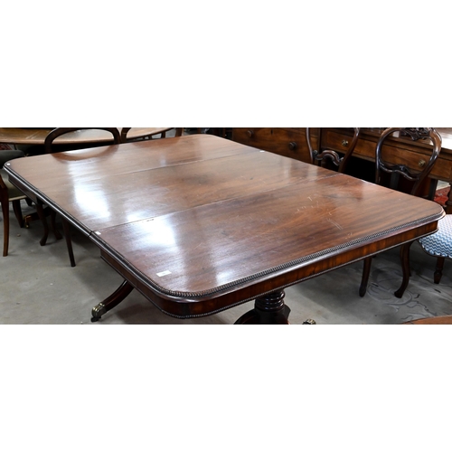 80 - A 19th century mahogany extending dining table, the moulded top with single central leaf raised on t... 