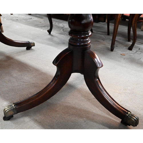 80 - A 19th century mahogany extending dining table, the moulded top with single central leaf raised on t... 