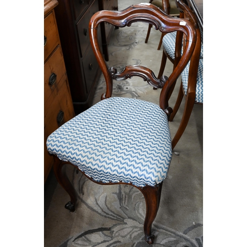 81 - A Harlequin set of six Victorian rosewood balloon back dining chairs with blue and cream herringbone... 