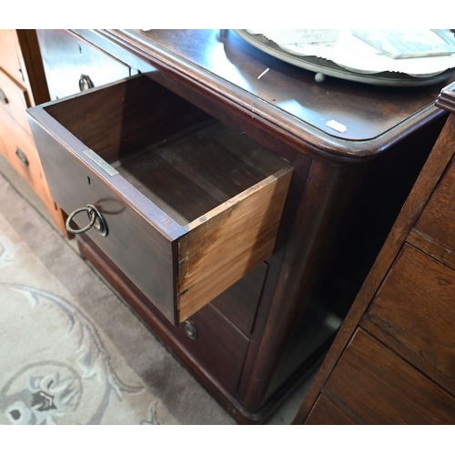 84 - A 19th mahogany chest of two short over two long drawers on bun feet (missing one ring handle) 90 cm... 