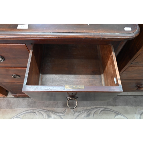 84 - A 19th mahogany chest of two short over two long drawers on bun feet (missing one ring handle) 90 cm... 