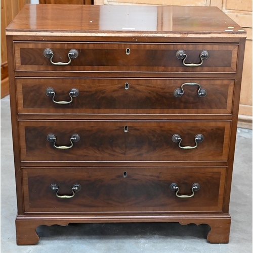 86 - A George III style reproduction chest of four long graduating drawers on shaped bracket feet, 75 cm ... 