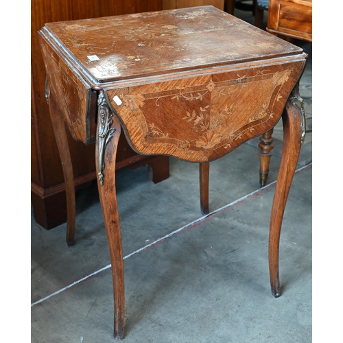 91 - A French kingwood and marquetry serpentine drop leaf side table with decorative floral inlay, shaped... 