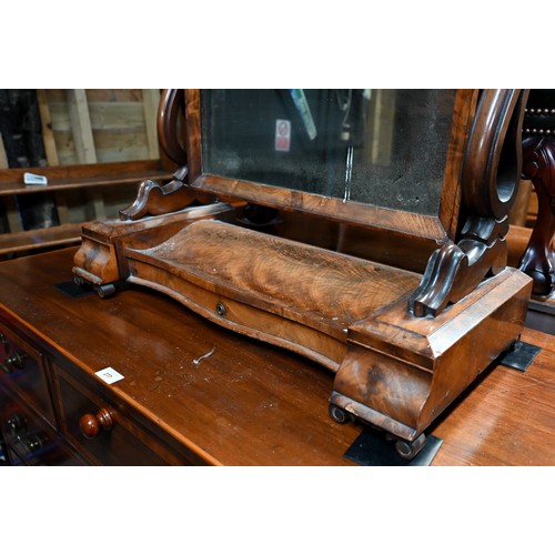 64 - A Victorian mahogany fold over double gateleg tea table, with single frieze drawer, raised on square... 