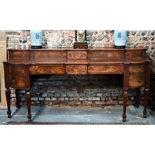 283 - A George III figured mahogany stage-back sideboard, the superstructure with two sliding door compart... 