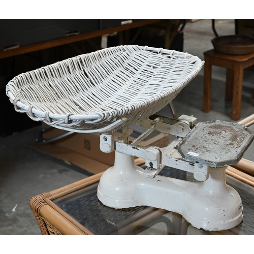 183 - A Victorian painted papier-maché baby bath on metal stand, 56 cm high to/w a set of baby-scales (2)