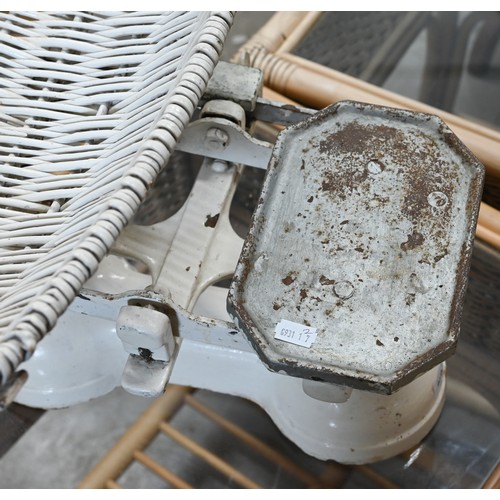 183 - A Victorian painted papier-maché baby bath on metal stand, 56 cm high to/w a set of baby-scales (2)