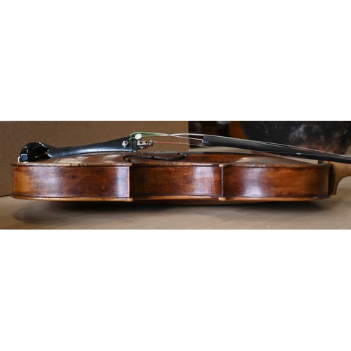 511 - An antique German violin with 35.5cm two-piece back; bears label for 'Sebastian Kloz, Mittenvald, 17... 