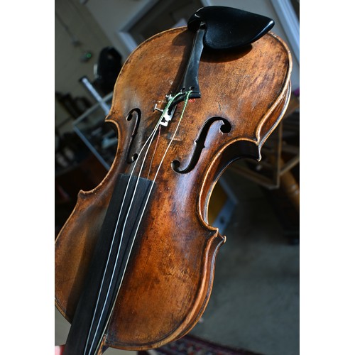 511 - An antique German violin with 35.5cm two-piece back; bears label for 'Sebastian Kloz, Mittenvald, 17... 