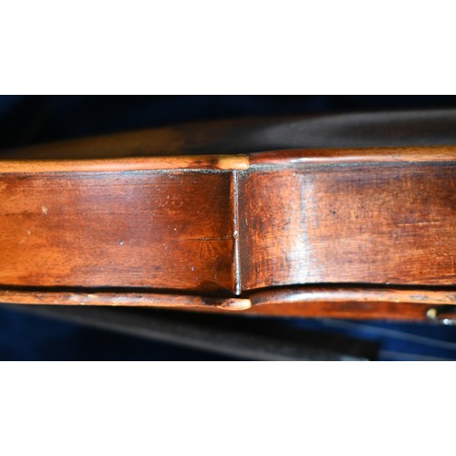 511 - An antique German violin with 35.5cm two-piece back; bears label for 'Sebastian Kloz, Mittenvald, 17... 