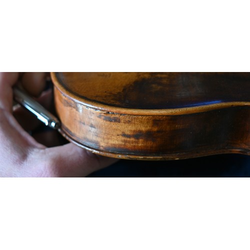 511 - An antique German violin with 35.5cm two-piece back; bears label for 'Sebastian Kloz, Mittenvald, 17... 