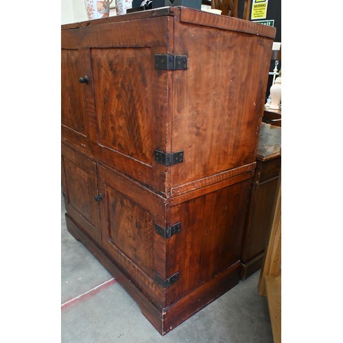 76 - A scumbled pine two-section pantry cupboard with four panelled doors enclosing shelves, 105 cm w x 5... 