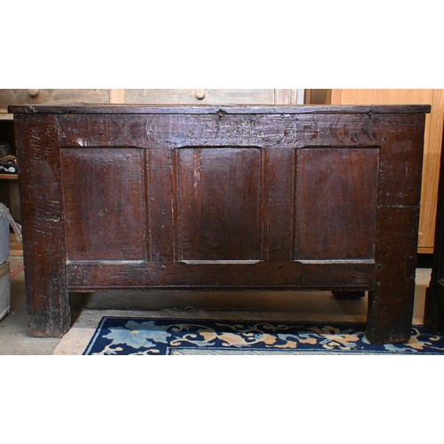 67 - An antique oak linenfold carved coffer, panelled construction with hinged top, 110 cm w x 50 cm d x ... 