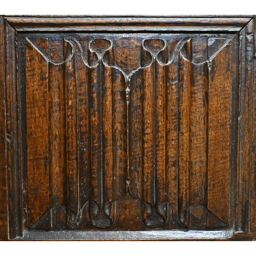 67 - An antique oak linenfold carved coffer, panelled construction with hinged top, 110 cm w x 50 cm d x ... 