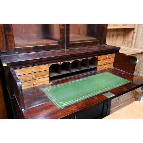 30 - A Victorian mahogany secretaire bookcase, the pair of glazed-in doors over a fitted secretaire drawe... 