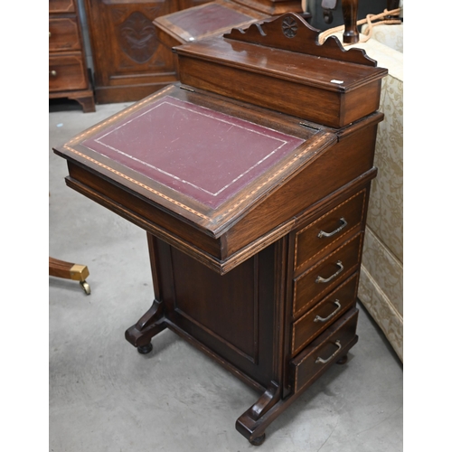 152 - An Edwardian mahogany inlaid Davenport with hinged top inset with tooled leather with four side draw... 