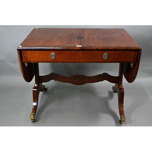 102 - A Regency cross-banded satinwood sofa table, the drop leaf top over two frieze drawers and opposing ... 