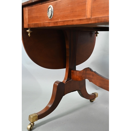 102 - A Regency cross-banded satinwood sofa table, the drop leaf top over two frieze drawers and opposing ... 