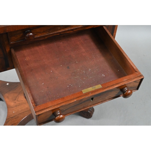 108 - A Victorian rosewood drop leaf work table, with two drawers to one end opposing dummy drawers, raise... 