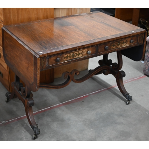 114 - A Regency crossbanded rosewood and brass inlaid sofa table with two drawers and opposing dummy drawe... 