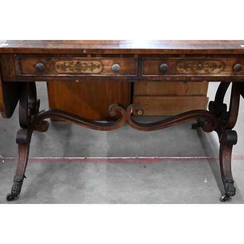 114 - A Regency crossbanded rosewood and brass inlaid sofa table with two drawers and opposing dummy drawe... 