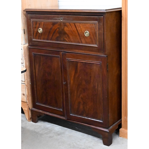 122 - A 19th century mahogany secretaire cabinet, the drop-front drawer with fitted interior over a pair o... 