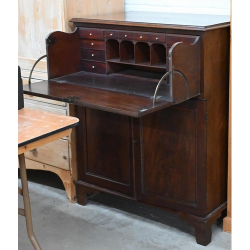 122 - A 19th century mahogany secretaire cabinet, the drop-front drawer with fitted interior over a pair o... 