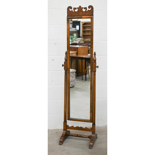 138 - A fret-cut walnut framed cheval mirror, 180 cm h x 50 cm d