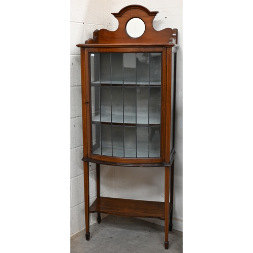 146 - An Edwardian walnut bowfront display cabinet with lead-glazed door, 64 cm w x 40 cm d x 174 cm h