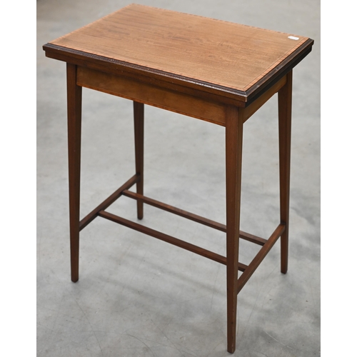 158 - A small Edwardian satin wood card table with baize lined folding top on slender square supports unit... 