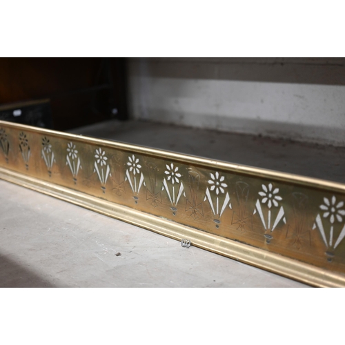 162 - An early 20th century brass fender pierced with floral motif alternating with engraved cross of St P... 