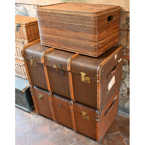 19 - Three various wicker hampers, to/with a wicker box seat, two vintage brass bound trunks and a staine... 