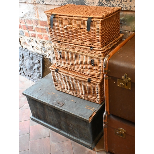 19 - Three various wicker hampers, to/with a wicker box seat, two vintage brass bound trunks and a staine... 