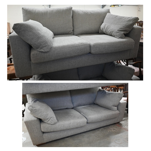 A pair of contemporary Marks and Spencers box arm 'Geneva Special' medium two-seater sofas (2018) upholstered in grey colwyn fabric, standing on square tapering stained hardwood feet, 176 cm w x 96 cm d x 90 cm h