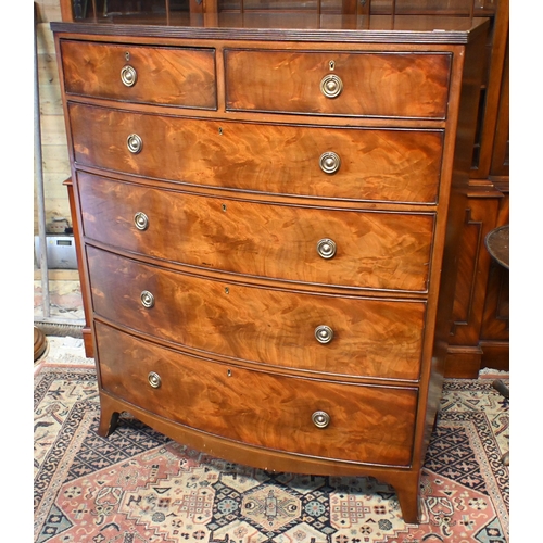 26 - A 19th century mahogany bowfront chest of two short over three long graduated drawers, raised on spl... 