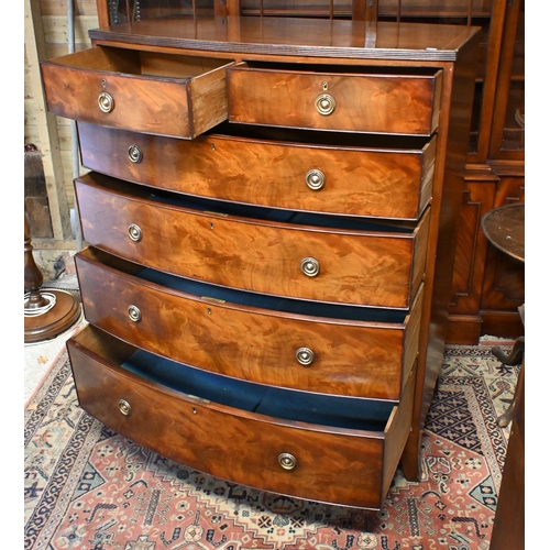 26 - A 19th century mahogany bowfront chest of two short over three long graduated drawers, raised on spl... 