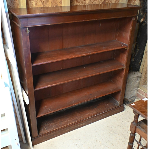 28 - An antique satinwood low open bookcase, with adjustable shelves on a plinth base