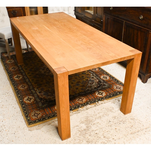 39 - A contemporary oak dining table, raised on square corner legs 180 cm w x 90 cm d x 77 cm h