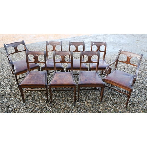 40 - A set of eight Victorian mahogany dining chairs, with shaped splats over leather seats, raised on sq... 