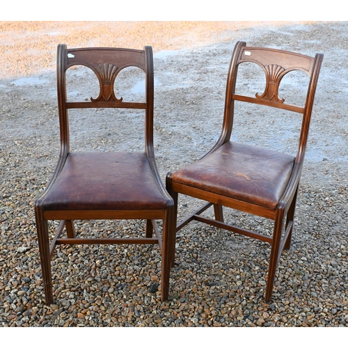 40 - A set of eight Victorian mahogany dining chairs, with shaped splats over leather seats, raised on sq... 