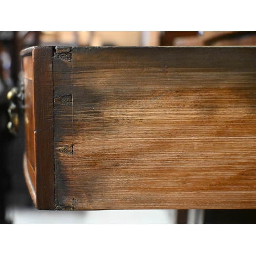 48 - A George III cross-banded bowfront satinwood sideboard, centred by a drawer flanked by a twin dummy ... 