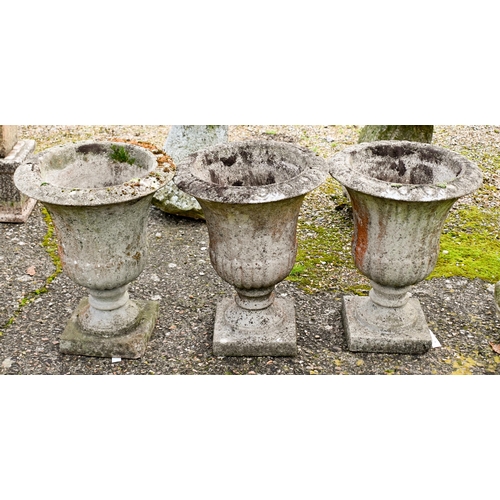 5 - A trio of weathered cast stone urn planters (3)