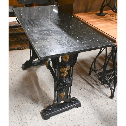 51 - An antique Singer sewing machine cast iron trestle table, with later composite top 107 cm w x 51 cm ... 