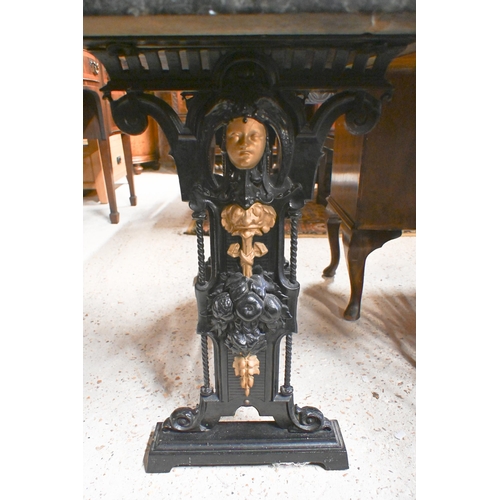 51 - An antique Singer sewing machine cast iron trestle table, with later composite top 107 cm w x 51 cm ... 