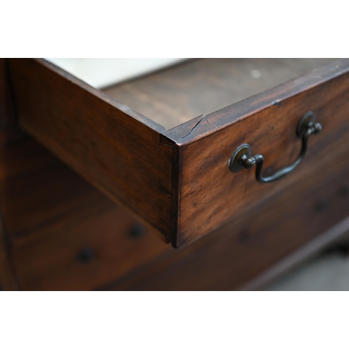 68 - A 19th century mahogany fall-front bureau with fitted interior over four long graduating drawers rai... 