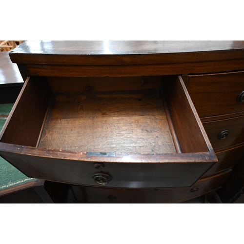 70 - A 19th century mahogany bowfront chest of two short over three long drawers raised on splayed bracke... 