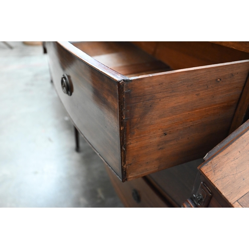 70 - A 19th century mahogany bowfront chest of two short over three long drawers raised on splayed bracke... 